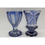 TWO 19TH CENTURY BOHEMIAN SPA GLASSES, blue flashed and cut, one with flared trumpet bowl on lobed