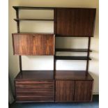 A GOOD SELECTION OF ROSEWOOD DANISH MODULAR WALL MOUNTING SHELVING & CABINETS, designed in the 1960s