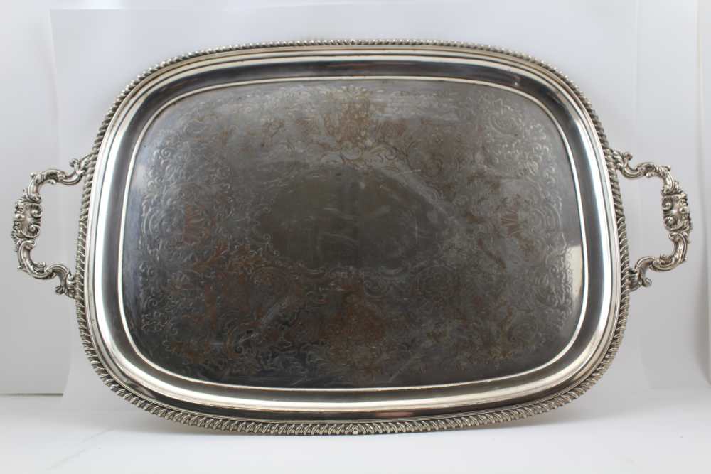 AN EARLY 20TH CENTURY SILVER-PLATED TRAY with cast handles together with a three piece half fluted - Image 2 of 5