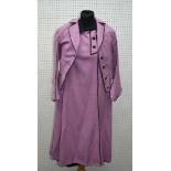 A LADY'S RIDING HABIT, comprising jacket and skirt, pink wool herringbone with black detail,