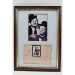 LAUREL & HARDY AUTOGRAPHS on tinted paper inscribed "Thank you Mary", mounted in a frame with images