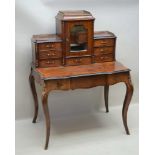 A LATE 19TH CENTURY FRENCH WALNUT BUREAU PLAT, the inlaid galleried superstructure having central