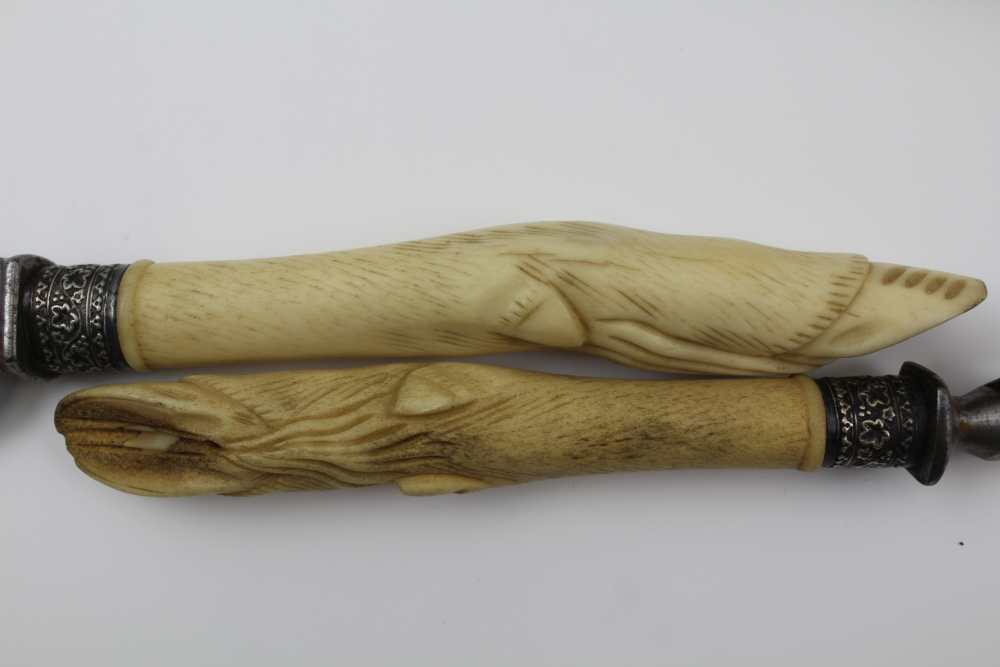 THOMAS TURNER OF SHEFFIELD A CASED MEAT & GAME CARVING SET, the handles carved bone to represent - Image 3 of 4