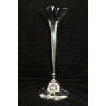 HORACE WOODWARD & CO LTD A SILVER VASE of trumpet form, on lobed platform base, London 1900,