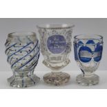 THREE 19TH CENTURY BOHEMIAN SPA GLASSES, blue flashed and cut, one with spiral twist bowl, one