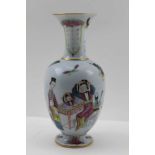 A CHINESE CERAMIC VASE of baluster form, with flared neck on circular platform base, hand painted