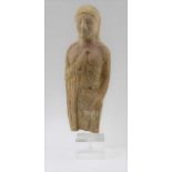 A GREEK MID 6TH CENTURY B.C. TERRACOTTA GODDESS STATUE, broken off at the knees, 22cm high, raised
