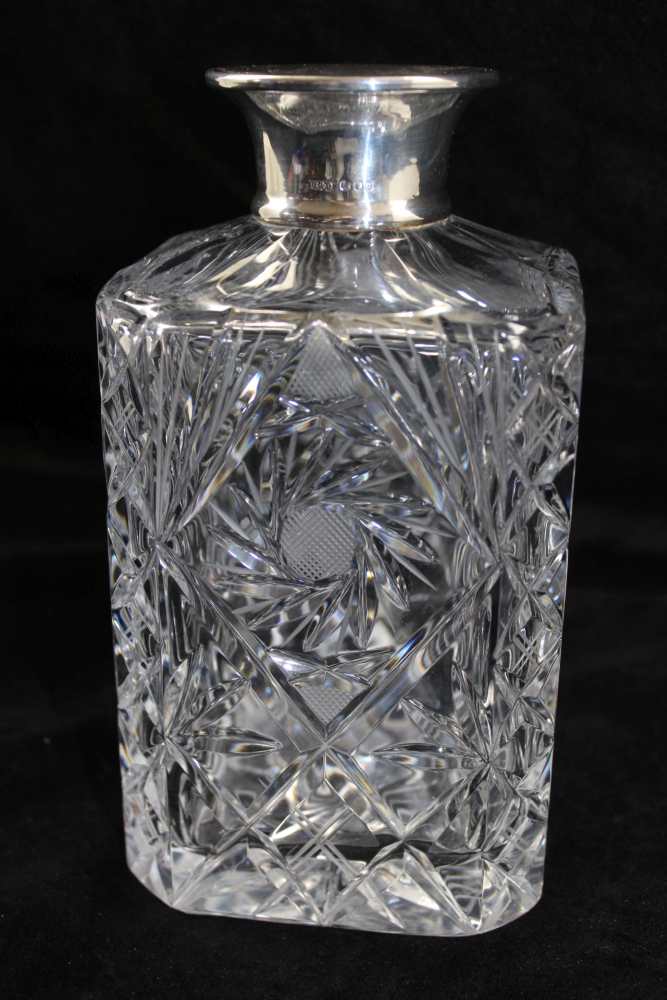 ROBERTS & DORE LTD A CUT GLASS DECANTER with silver mounts, London 1967, with faceted ball stopper - Image 2 of 4