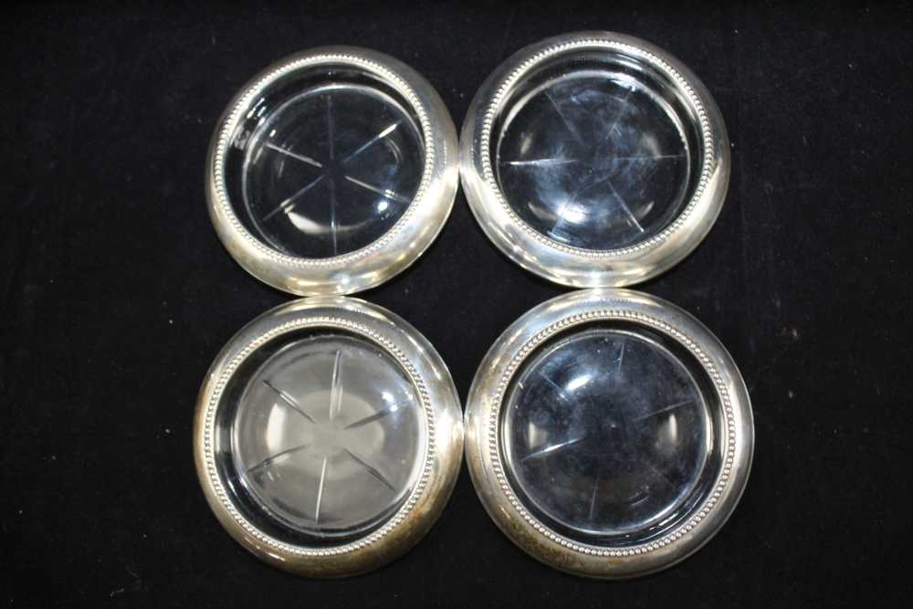 A SET OF FOUR SILVER MOUNTED MOULDED GLASS COASTERS, the four stamped 'Frank M Whiting & Co - Image 4 of 5