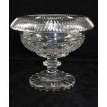 A LATE 18TH CENTURY GLASS BOWL with turnover rim, cut vertical flutes and diamond cut to the body,