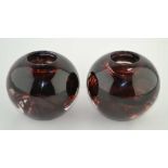 A PAIR OF "KOSTA BODA" SMOKEY GLASS NIGHT LIGHT HOLDERS, of globular form, inscribed to bases, 9cm