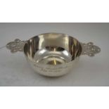 WILLIAM HUTTON & SONS LTD A SILVER WHISKY QUAICH, the shallow tasting bowl with two pierced handles,