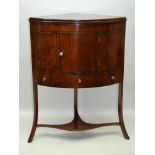 AN EARLY 19TH CENTURY MAHOGANY CORNER WASHSTAND, the hinged cover raises to become a splash back,