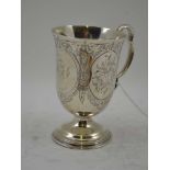 EDWARD JOHN BARNARD A SILVER TANKARD , of flared vase form, on outswept circular domed base,