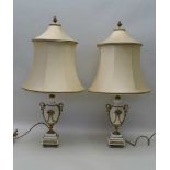 A PAIR OF WHITE MARBLE TABLE LAMPS, with gilt metal mounts, of vase form, raised on stepped square
