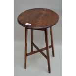 AN EDWARDIAN OAK OCCASIONAL TABLE, raised on four squared tapering supports, the top; 30cm