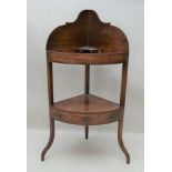 A 19TH CENTURY MAHOGANY FINISHED CORNER WASHSTAND, with removeable cover, the undertier having three