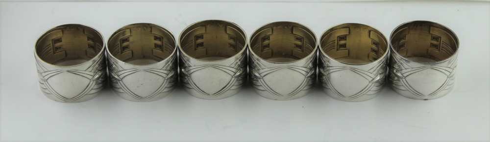 A SET OF SIX WMF SILVER PLATED NAPKIN RINGS, Art Nouveau decoration, bearing WMF Austerlich mark, c. - Image 4 of 4