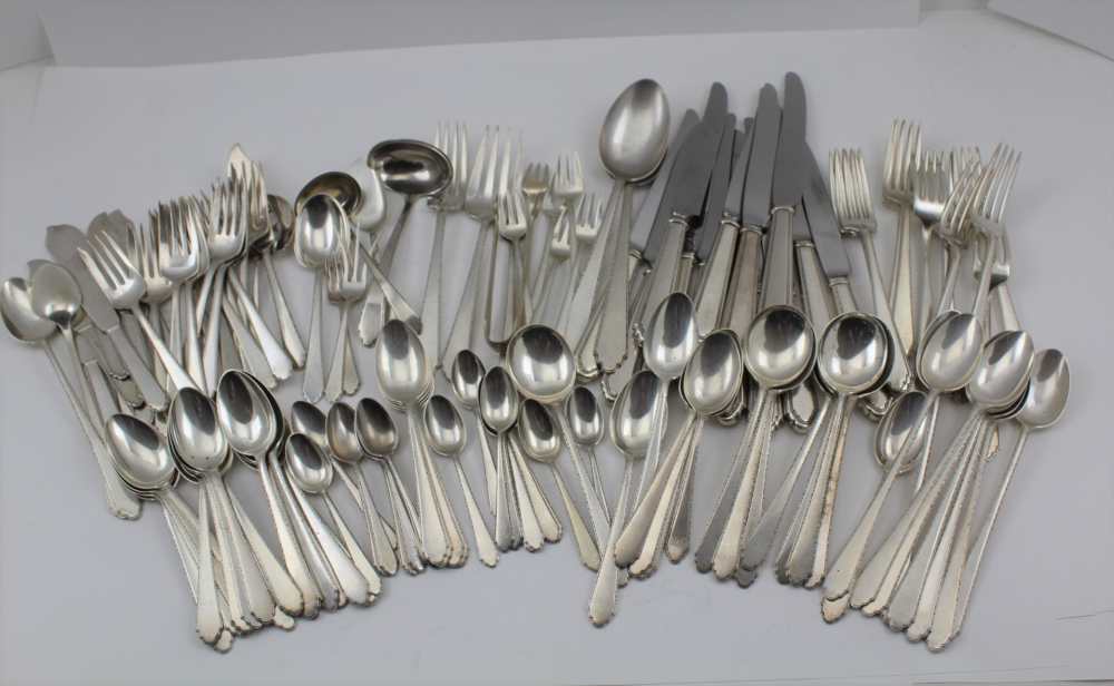 A CANTEEN OF STERLING FLATWARE, matching reeded edge, dog rose design, some marked 'Lunt' others '