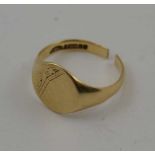 A GOLD SIGNET RING (cut), decoratively chased, without monogram, 4.5g