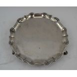 THOMAS BRADBURY & SONS LTD. AN EDWARDIAN SILVER WAITER of Georgian design, with piecrust rim on