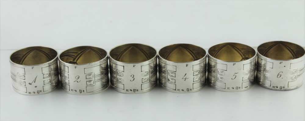 A SET OF SIX WMF SILVER PLATED NAPKIN RINGS, Art Nouveau decoration, bearing WMF Austerlich mark, c.
