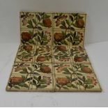 A SET OF SIX TILES OF FLORAL DESIGN, hand coloured sepia print, c.1920, 15.5cm square