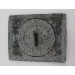 A LEAD SUNDIAL PANEL OF 18TH CENTURY DESIGN, rectangular with scallop devices to the corners, gnomon
