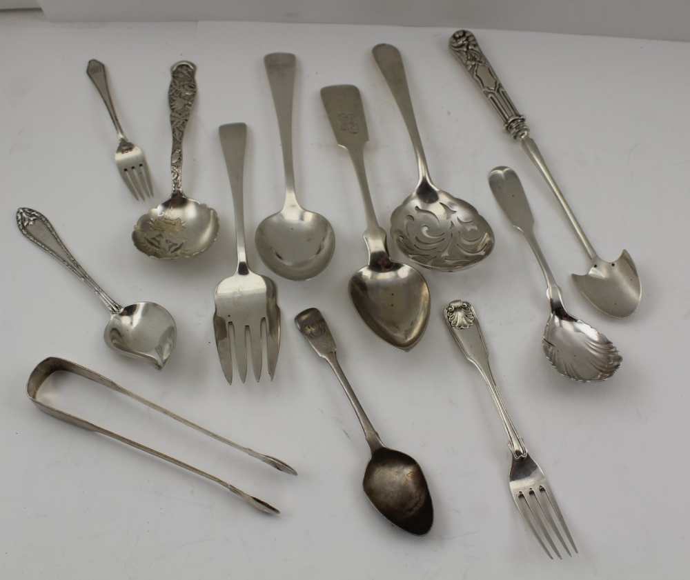 A PAIR OF GEORGE III SILVER SUGAR NIPS, London 1807, together with a collection of assorted Sterling