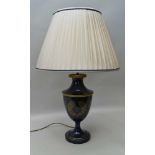 AN URN FORM TABLE LAMP, blue painted metal with gilded acorn & oak leaf wreath, fitted a pleated