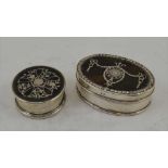 TWO EARLY 20TH CENTURY SILVER & TORTOISESHELL TRINKET BOXES, the circular one with inlaid