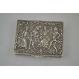 A CONTINENTAL WHITE METAL SNUFF BOX, the hinged cover embossed with dancing figures in 18th