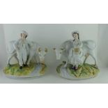 A PAIR OF 19TH CENTURY STAFFORDSHIRE POTTERY MANTEL FIGURES, cattle with figures, on moulded and