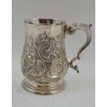 JOHN KING A GEORGE III SILVER TANKARD of baluster form, on circular platform foot, scroll handle,