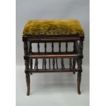 AN EDWARDIAN STAINED WOOD FRAMED PIANO STOOL, music store undertier, with baluster gallery and