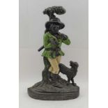 A VICTORIAN DESIGN CAST IRON DOORSTOP, "The Woodsman" with his dog, partially painted, 38.5cm high