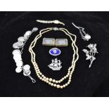 A TWO STRAND PEARL NECKLACE with silver clasp, a silver coin mounted BRACELET, THREE MARCASITE