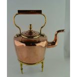 A 19TH CENTURY COPPER KETTLE, the cover with acorn finial, together with A CIRCULAR BRASS TRIVET