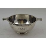 WALKER & HALL A SILVER WHISKY QUAICH, two handled tasting bowl, of plain form 11.3cm in diameter,