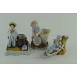 THREE CONTINENTAL CERAMIC VESTA HOLDERS / STRIKERS, figuratively moulded, one in the form of a boat,