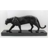 RICHARD SOUTHALL A BRONZE RESIN CASTING OF A WALKING LEOPARD, 74cm long (nose to tail), displayed on
