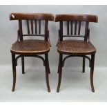 A PAIR OF THONET STYLE CAFE CHAIRS, having bentwood frames, bearing paper labels beneath seats, "B.