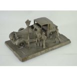A PEWTER "FRANKLIN MINT" SCULPTURE OF A 1937 ROLLS-ROYCE PHANTOM III with figures, the base 21cm x