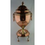 A GEORGE III COPPER URN OF VASE FORM, with lid, rams head and ring handles, fitted brass top on