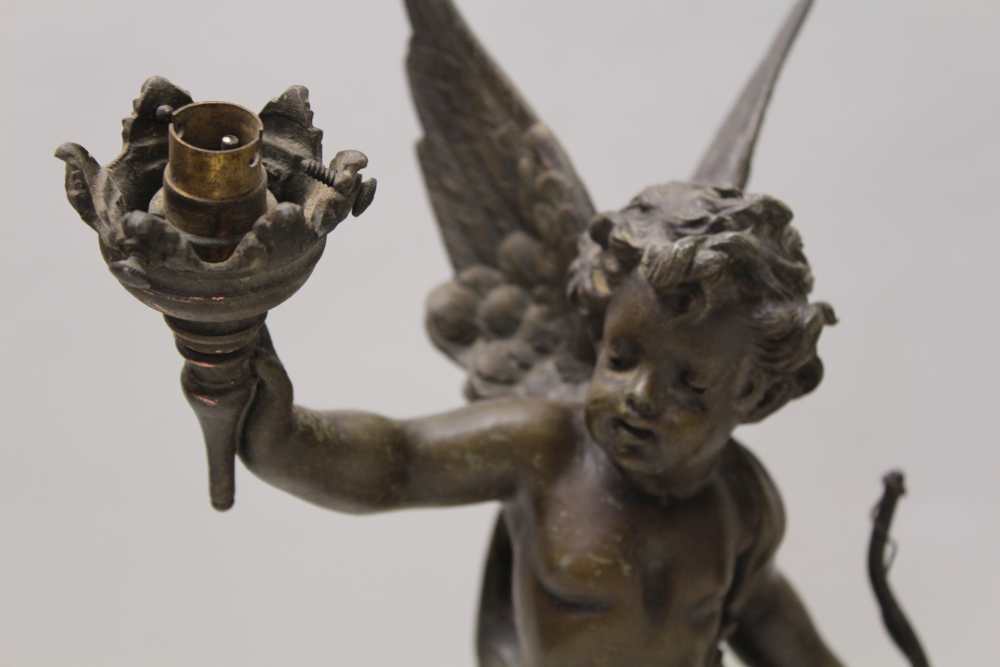 A PAIR OF EARLY 20TH CENTURY FRENCH BRONZE EFFECT SPELTER TABLE LAMPS, of cherub design, both with - Image 2 of 7