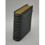 A VICTORIAN CARTE DE VISITE ALBUM, green leather bound with brass fittings, each page with mount