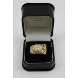 A SUBSTANTIAL GENTLEMAN'S 9CT GOLD BUCKLE RING, diamond set, total weight; 15.2g, ring size, "W"