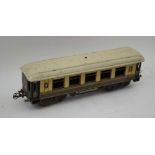 A BING "O" GAUGE TIN PLATE RAILWAY RESTAURANT CAR, "GWR" livery, No.3295, with opening doors and