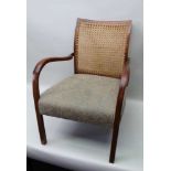A STAINED WOOD FRAMED MID-CENTURY OPEN ARMCHAIR, split cane panel back and upholstered seat