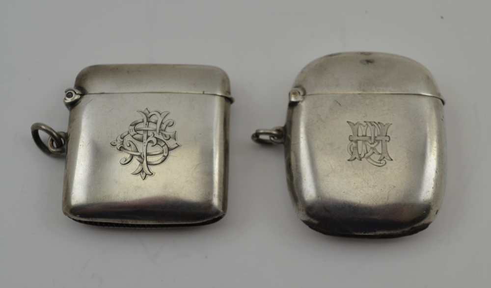 TWO PLAIN SILVER VESTAS, both monogrammed, one London 1896, the other Birmingham 1903, both with